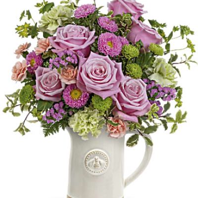Pour on the happiness! Mother's Day feels extra special when a beautiful rose bouquet is delivered in this artisanal glazed stoneware pitcher with charming sculpted bee detail. Food safe, it's sure to be a kitchen favorite for many years to come!