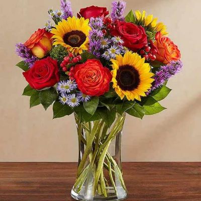 Bring the serene beauty of autumn to someone you care about with our country-inspired arrangement. Filled with a medley of fresh-picked blooms in brilliant colors, it’s a gift that’s sure to surprise & delight.