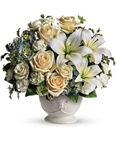 <div id="mark-2" class="m-pdp-tabs-marketing-description">This French country style sympathy arrangement communicates your condolences in a most heartfelt way. It's a lovely choice when you want to send flowers to family or friends.</div>
<p>&nbsp;</p>
<div id="desc-2">
<ul>
<li>A beautiful bouquet of blue and white sympathy flowers - blue hydrangeas, crème roses, white miniature carnations, fragrant white asiatic lilies and green pitta negra - are delivered in a French Country Pot.</li>
</ul>
</div>