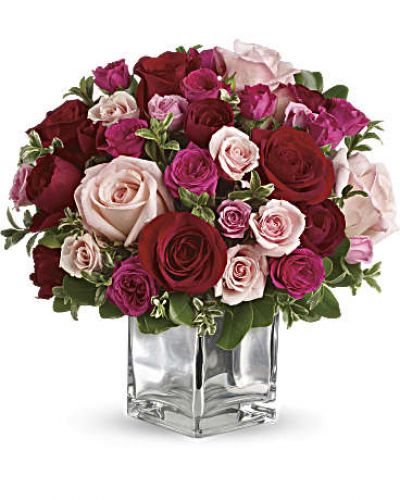 <p>Sing them a love song - with flowers. This lush, loving rose arrangement tells them just how much you care.  Colors may be substituted if not available.</p>