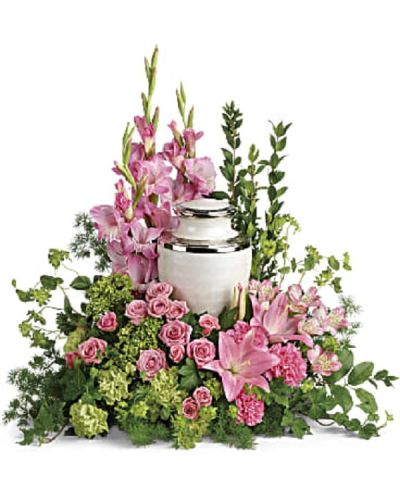 <div class="m-pdp-tabs-description">
<div id="mark-1" class="m-pdp-tabs-marketing-description">Surround the cremation urn with gorgeous, graceful pink blooms that show deep gratitude for a beautiful life.</div>
</div>
<p id="arrngDescp">This pretty arrangement includes miniature green hydrangea, pink spray roses, pink asiatic lilies, pink alstroemeria, pink gladioli, pink carnations, green carnations, bupleurum, green ivy, myrtle, ming fern, and lemon leaf.</p>
<p>Arrangement does not include urn.</p>