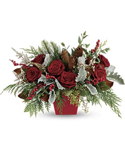 Deck the halls, and table, with this artisanal mix of winter greens, berries and roses, artfully arranged in a tapered red cube.