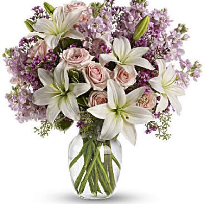 <div id="mark-3" class="m-pdp-tabs-marketing-description">Put your love into the season's most romantic flowers - light pink roses, fragrant white asiatic lilies and other favorites in a dazzling clear glass vase. Love will blossom in the most intoxicating way for a full week. You'll both enjoy it.</div>
<div id="desc-3">
<ul>
<li>This spectacular bouquet includes light pink spray roses, white asiatic lilies, lavender stock and lavender waxflower accented with assorted greenery.</li>
</ul>
</div>
