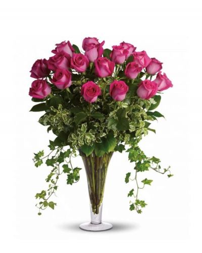 Make her dreams come true with this vase full of vibrant, long-stemmed hot pink roses hand-arranged with ivy and other garden greens. Your dreams just might come true too.