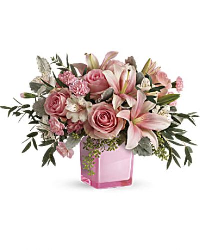 Just fabulous! From its perky pink cube and perfect pink roses, to its textural greens and dramatic pink lilies, this chic bouquet is flora at its finest!
This gorgeous bouquet features pink roses, pink asiatic lilies, white alstroemeria, pink miniature carnations, dusty miller, parvifolia eucalyptus, and seeded eucalyptus.