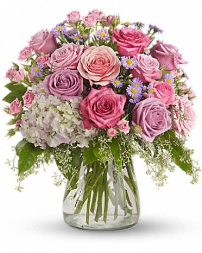 <div class="m-pdp-tabs-description">
<div id="mark-1" class="m-pdp-tabs-marketing-description">This softly elegant gesture of gentle colors that is perfect for any occasion.</div>
</div>
<p id="arrngDescp">Lavender and pink flowers such as roses, hydrangea, monte cassino asters, eucalyptus and salal are arranged in a clear glass vase.</p>