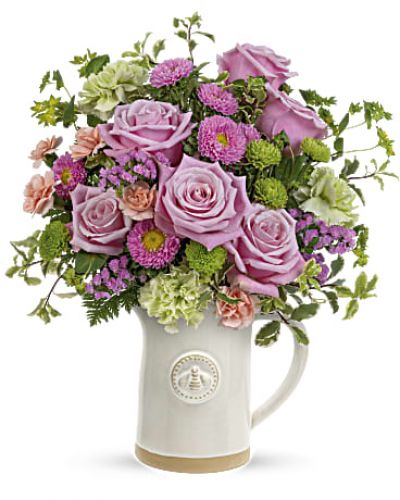 Pour on the happiness! Mother's Day feels extra special when a beautiful rose bouquet is delivered in this artisanal glazed stoneware pitcher with charming sculpted bee detail. Food safe, it's sure to be a kitchen favorite for many years to come!