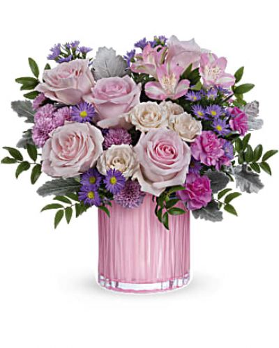<p>Rosy, radiant and perfectly posh! Teleflora's Rosy Pink Bouquet with a fabulously feminine arrangement in a pearlescent pink glass vase with sculpted details is the perfect Mother's Day surprise.</p>