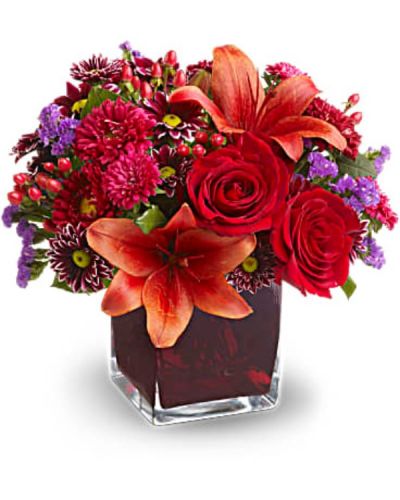 <div id="mark-3" class="m-pdp-tabs-marketing-description">Roses, lilies and asters in precious gemstone colors of garnet are nestled into a richly colored plum glass cube vase, creating a graceful presentation. Purple chrysanthemums and seafoam statice add a special touch. A beautiful bouquet for any occasion!</div>
<p>&nbsp;</p>
<div id="desc-3">Red roses, Asiatic lilies, Matsumoto asters and hypericum; purple daisy spray chrysanthemums and seafoam statice are delivered in a cube vase.</div>