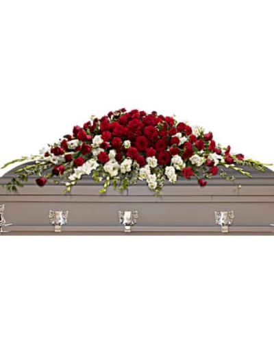 <div id="mark-1" class="m-pdp-tabs-marketing-description">A traditional tribute that communicates deep love and eternal commitment. This dramatic red and white casket spray is ideal for a full couch or closed casket, mixing dozens of deep red roses with the pure white beauty of gladioli and stock.</div>
<div id="desc-1">
<ul>
 	<li>Red roses and carnations are paired with snow white gladioli and stock, then accented with greens including variegated ivy and salal.</li>
</ul>
</div>