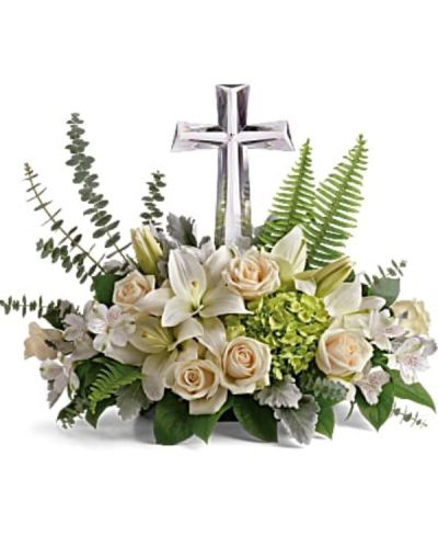 <div id="mark-3" class="m-pdp-tabs-marketing-description">This reverant bouquet of serene white flowers is a beautiful sharing of sympathy, adorned with a majestic crystal cross keepsake.</div>
<div id="desc-3">
<ul>
<li>Green hydrangea, crème roses, white asiatic lilies, and white alstroemeria are accented with dusty miller, sword fern, spiral eucalyptus, and lemon leaf.</li>
</ul>
</div>
