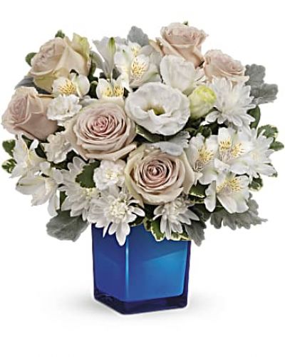 <div id="mark-3" class="m-pdp-tabs-marketing-description">Bursting with gorgeous roses and blooms, this cobalt glass cube vase is a gorgeous gift that can also serve as a beautiful candleholder!</div>
<p> </p>
<div id="desc-3">This splendid bouquet features crème roses, white cushion spray chrysanthemums, white lisianthus, white alstroemeria, miniature white carnations, dusty miller and variegated pittosporum.</div>