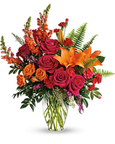 <div class="m-pdp-tabs-description">
<div id="mark-2" class="m-pdp-tabs-marketing-description">The bright stuff for punching up anyone's mood! Bring happiness to any day with this bold, sunset-inspired blend of hot pink roses and orange lilies in a classic glass vase!</div>
</div>
<p id="arrngDescp">Hot pink roses, orange spray roses, orange asiatic lilies, hot pink carnations, red miniature carnations, orange snapdragons, and pink heather are accented with sword fern, huckleberry, seeded eucalyptus, and lemon leaf. Delivered in a clear glass vase.</p>